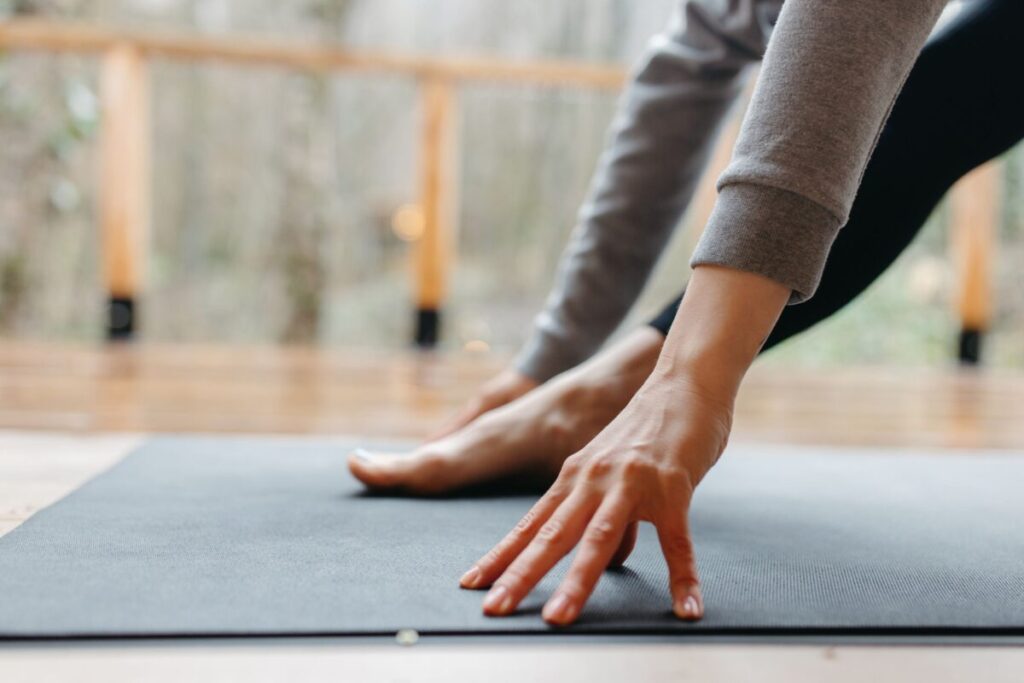 Yoga poses such as child's pose, happy baby, and downward dog can help relieve trapped gas and bloating. Moves that involve twisting your midsection, forward bends, squats, knees to chest, and bridges encourage gas to pass through your digestive tract. These moves can also lower stress levels, making it easier to relax and pass gas.