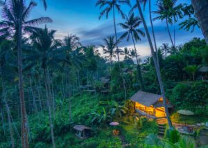 A serene Bali yoga retreat setting overlooking the ocean.