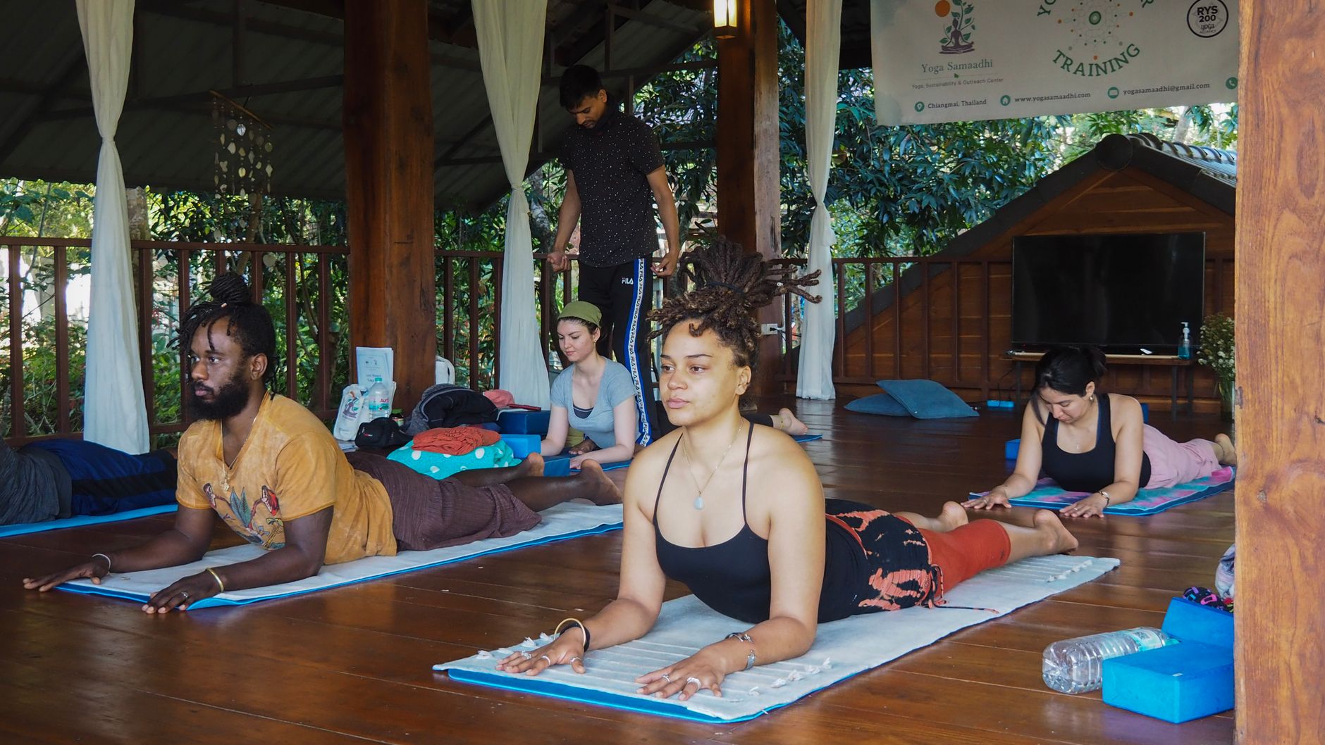 Yoga Instructor Training in Bali Yoga instructor training session in Bali with students.