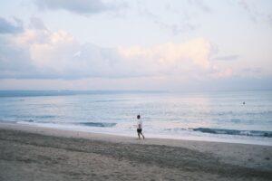 Bali beach sunset with yoga mat