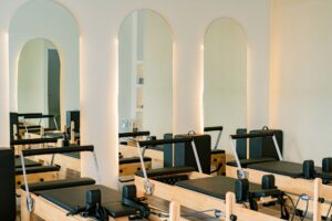 A peaceful yoga studio in Bali filled with natural light.