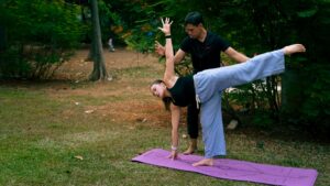 Yoga teacher training session in a serene setting