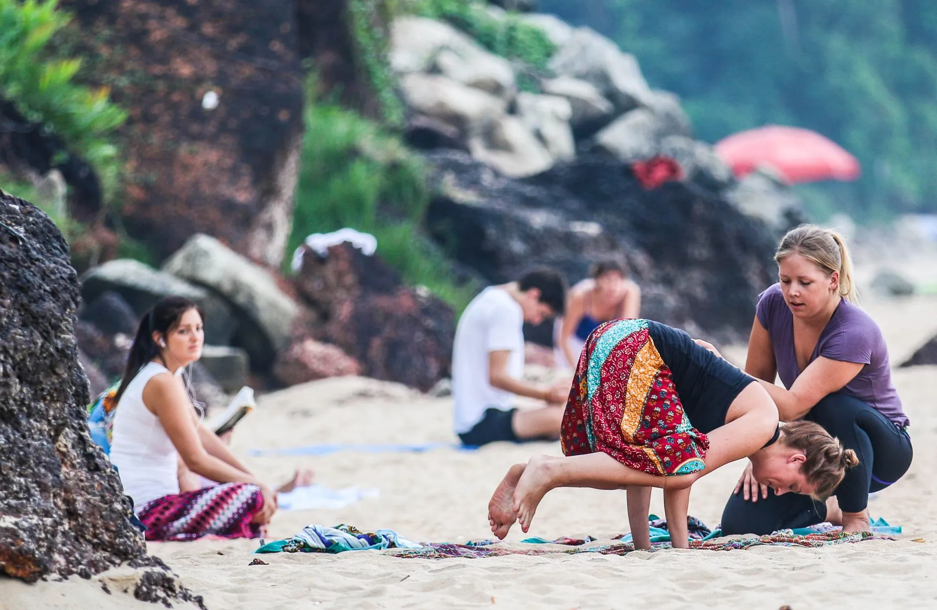 Outdoor yoga class in Bali during sunset