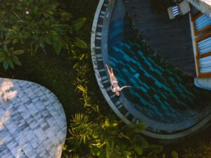 Wellness retreat facilities in Bali with swimming pool and relaxing spaces.