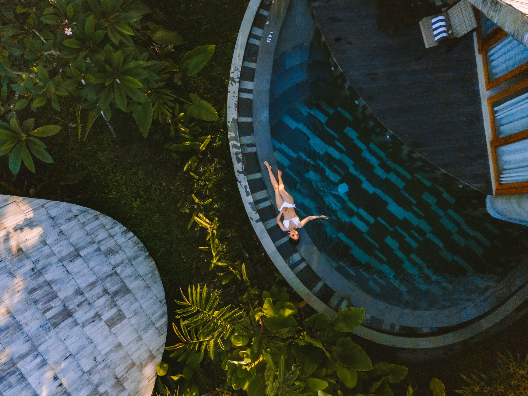 Wellness retreat facilities in Bali with swimming pool and relaxing spaces.