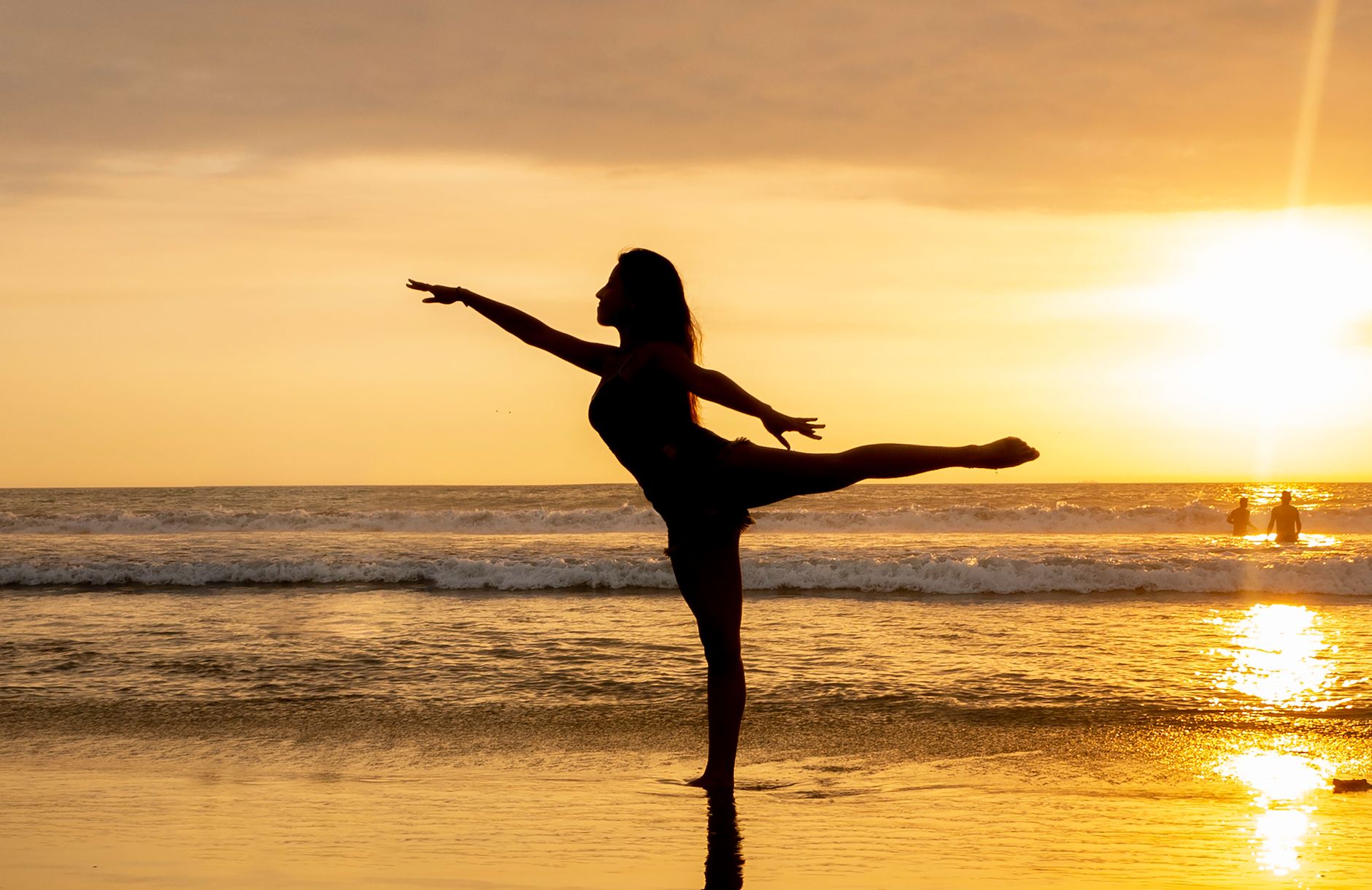 Sunset Yoga Session Sunset yoga session on a Bali beach
