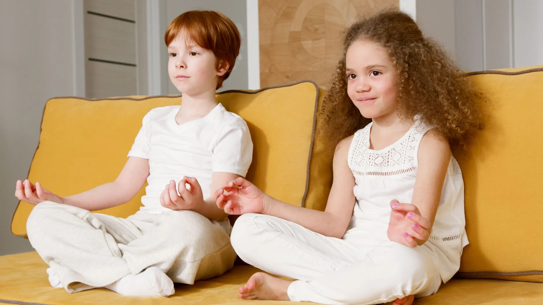 Children meditating in a yoga class