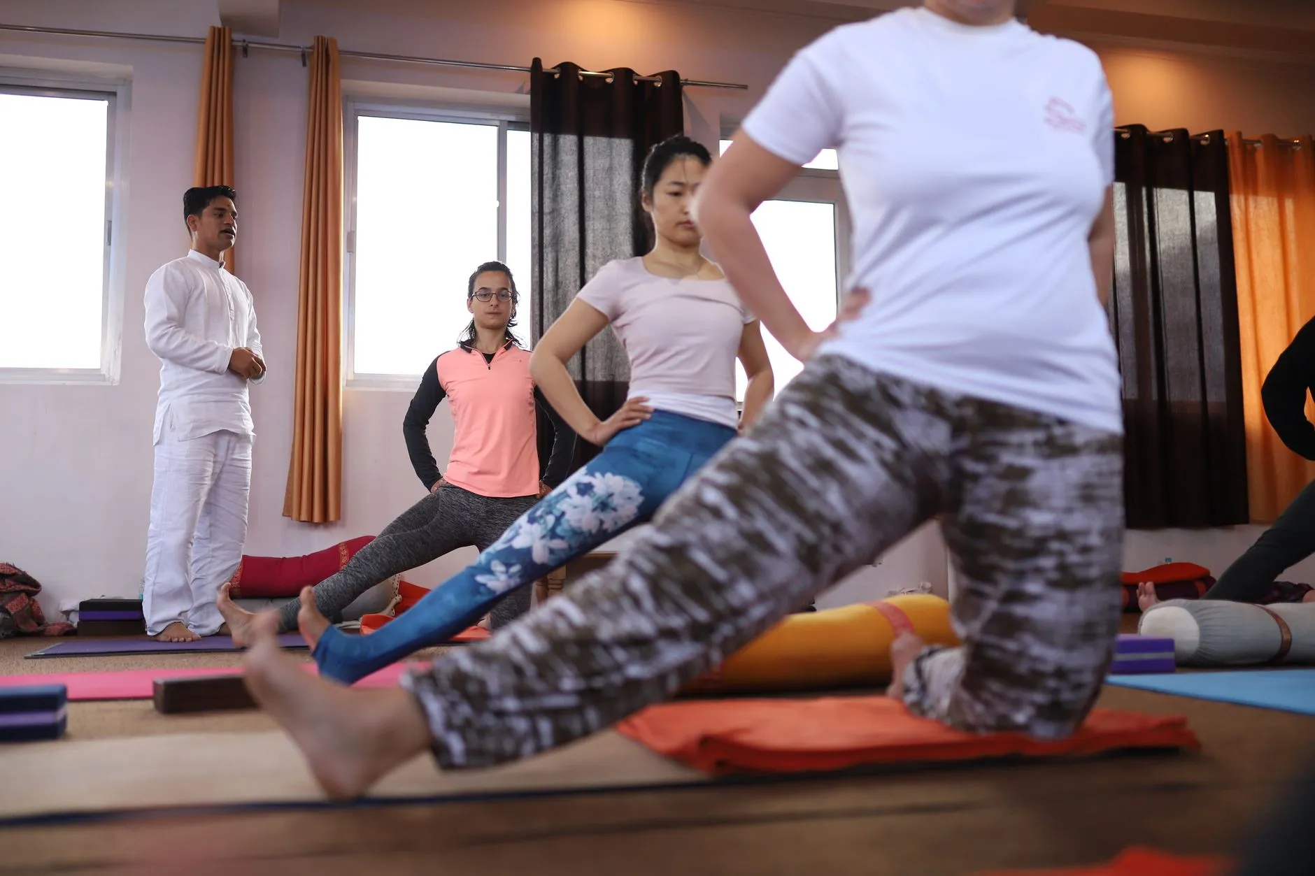 Yoga Philosophy Study Students studying yoga philosophy in a serene setting