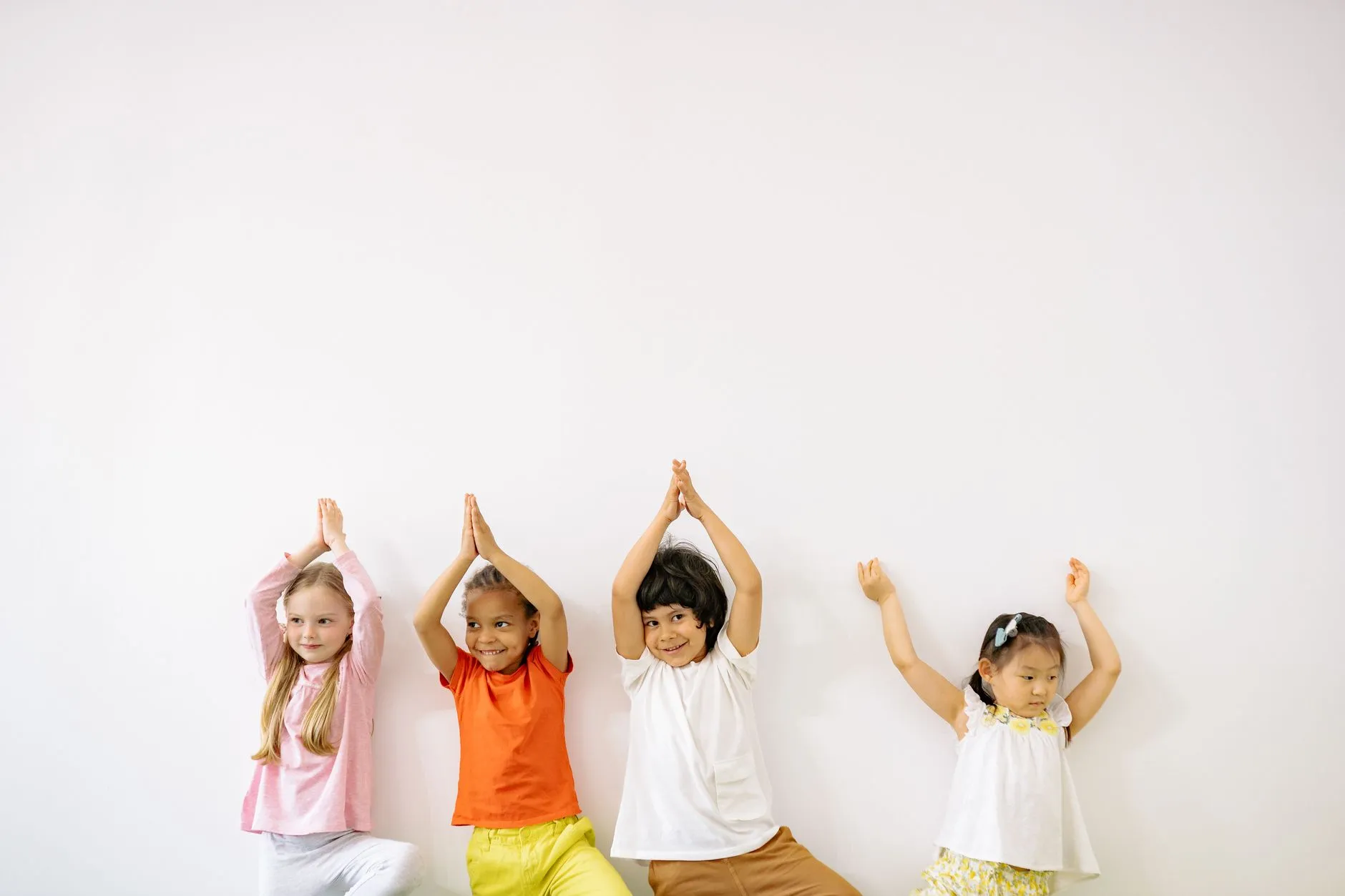Kids engaged in a fun yoga class