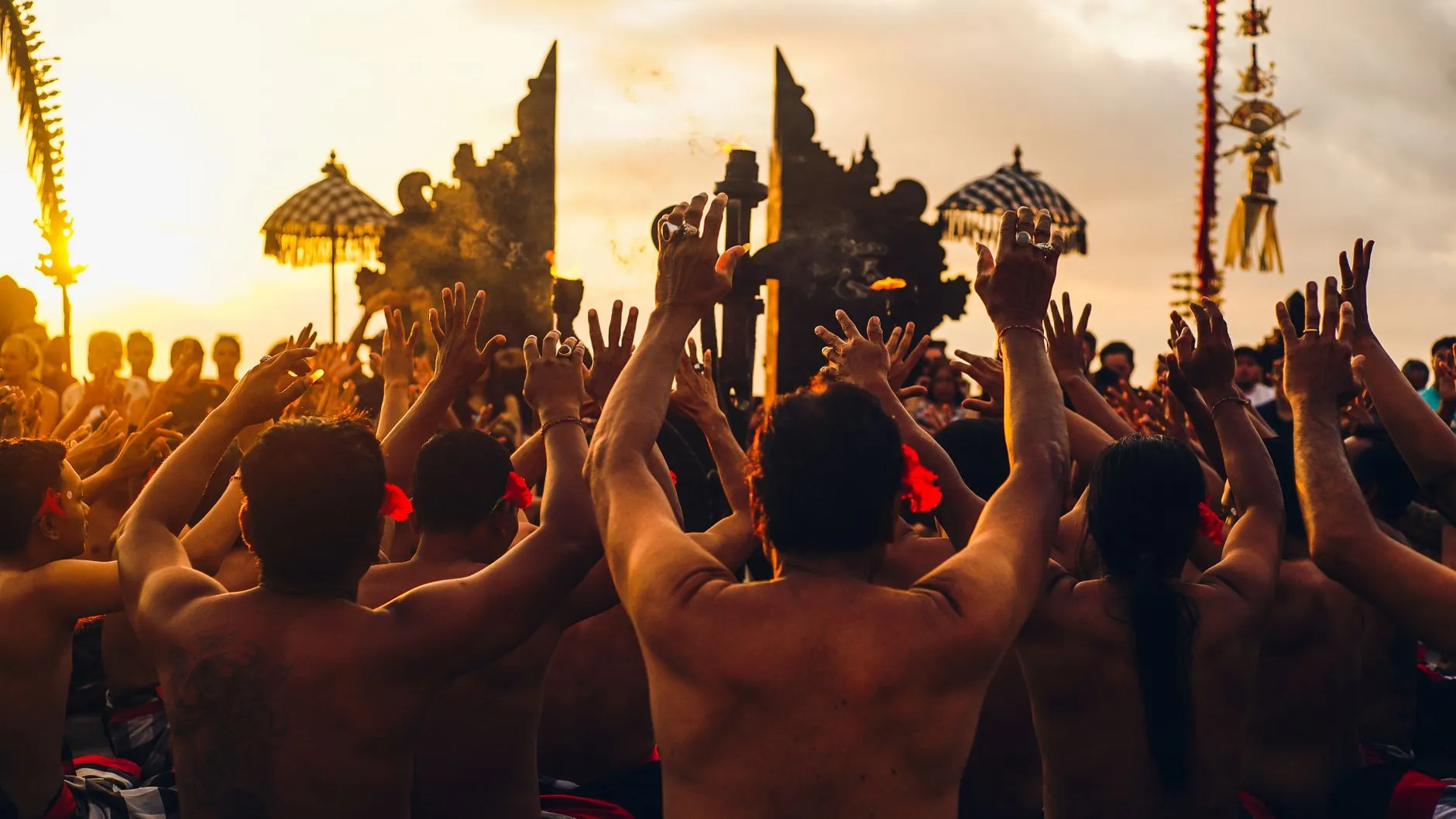 Yoga practitioners enjoying a sunset in Bali's serene environment